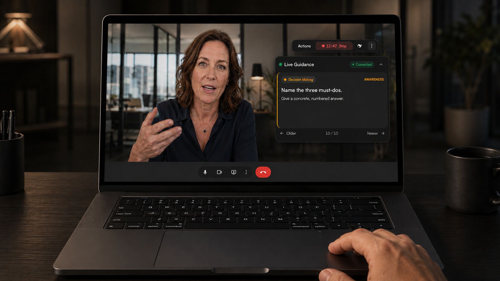 Commander live guidance on a laptop during a video call, prompting the leader to name three must-dos.
